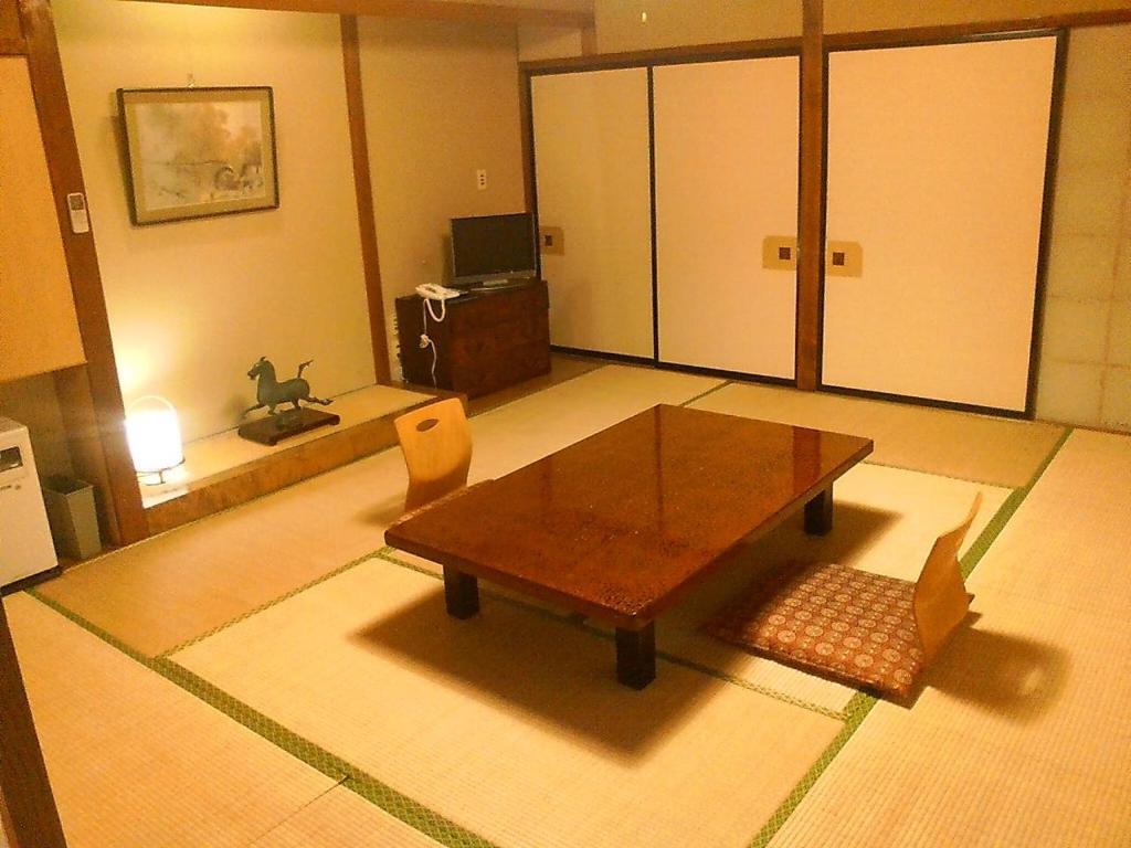 Kamesei Ryokan Chikuma Habitación foto